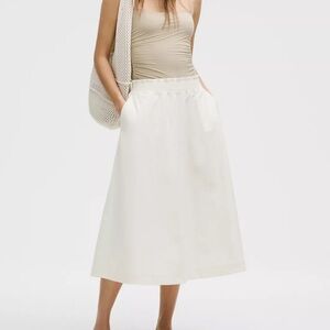 Lululemon Women’s Light Ivory Stretch Woven Ruffle-Waist Midi Skirt size Large